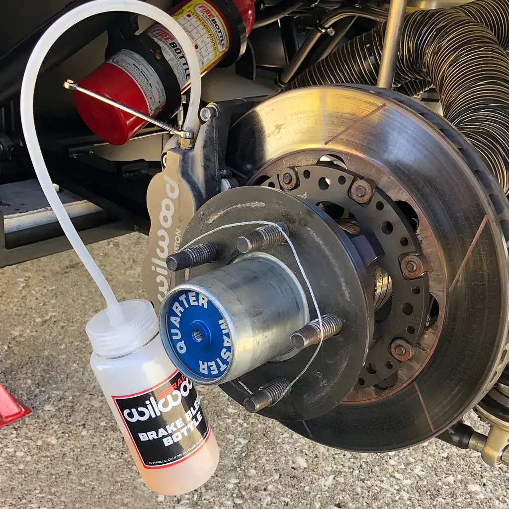Wilwood-Brake-Bleed-Bottle-race-car.webp